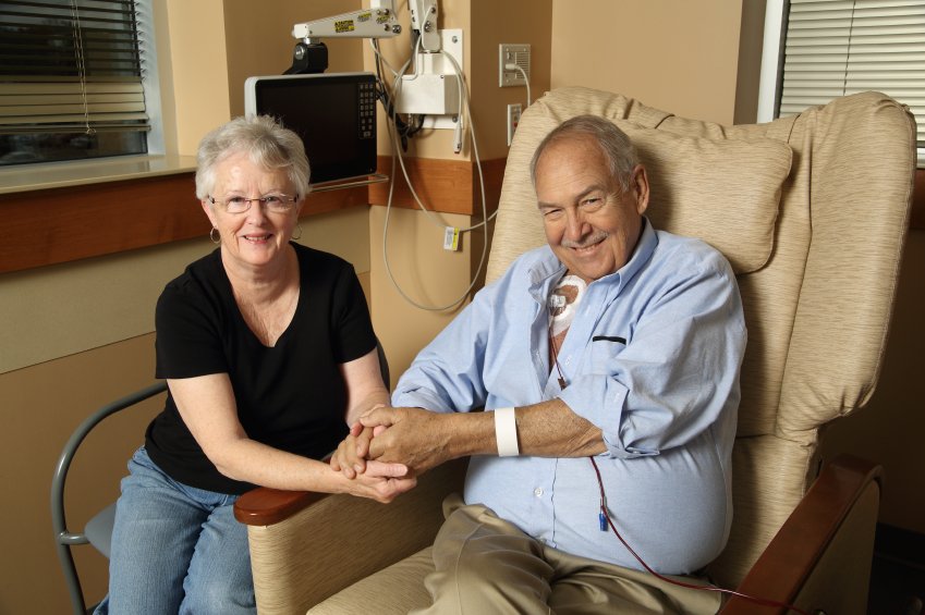 cancer patient and caregiver in the oncology center during treatment
